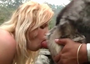 Outdoor bestiality oral sex with a blonde