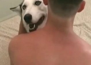 Kinky zoophile finger-blasting a dog